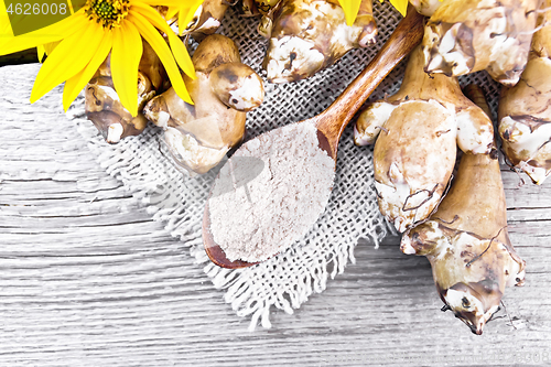 Image of Flour of Jerusalem artichoke in spoon on board top