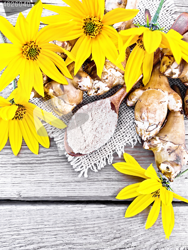 Image of Flour of Jerusalem artichoke in spoon on burlap top