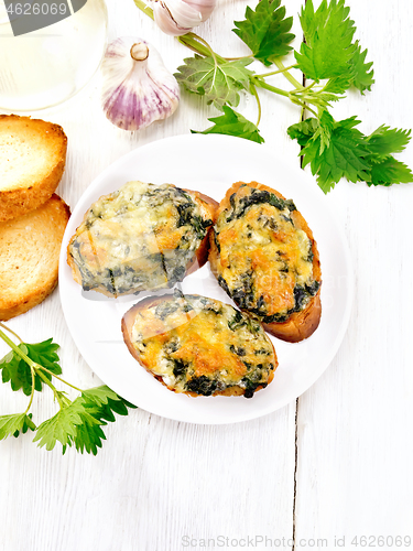 Image of Sandwich of nettle in plate on board top