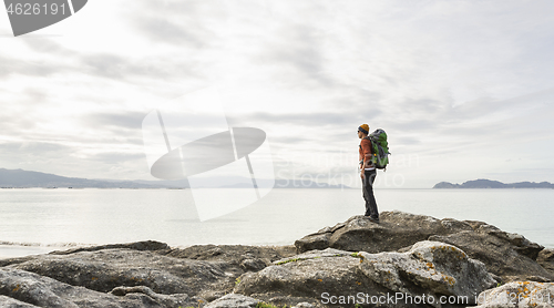 Image of Man exploring the coast