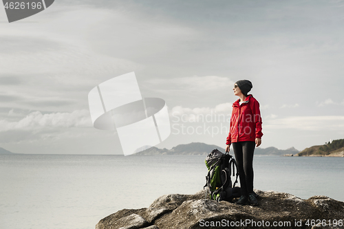 Image of Woman exploring the coast