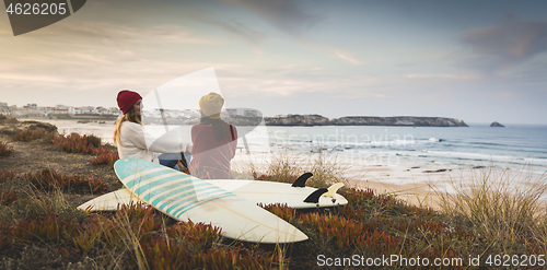 Image of Surfer girls at the beach