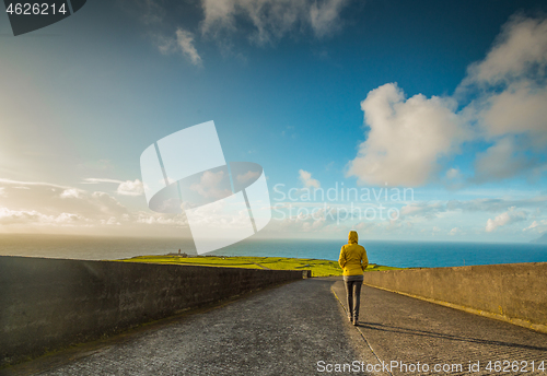 Image of Walking by the road