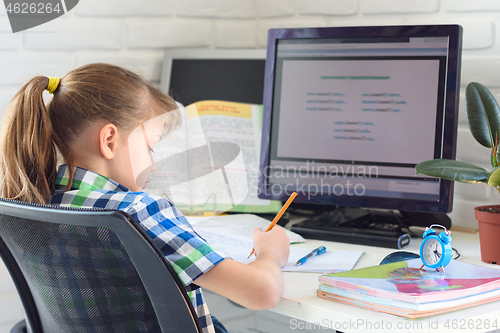 Image of The child learns remotely on the computer