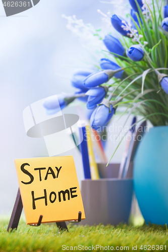 Image of Adhesive note with Stay Home text at the green office