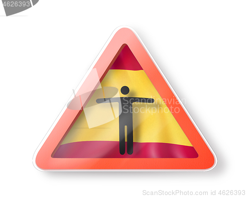 Image of Warning sign with black man\'s figure on the Spanish flag.