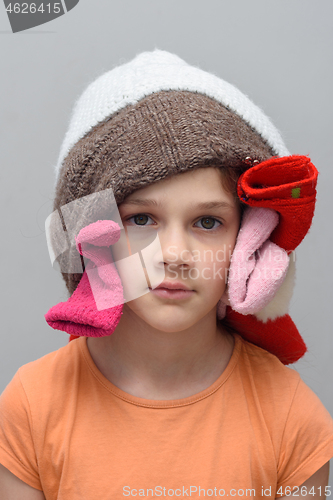 Image of Portrait of a funny girl with a bunch of things on her head