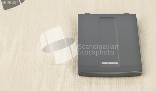 Image of Image scanner on wood background