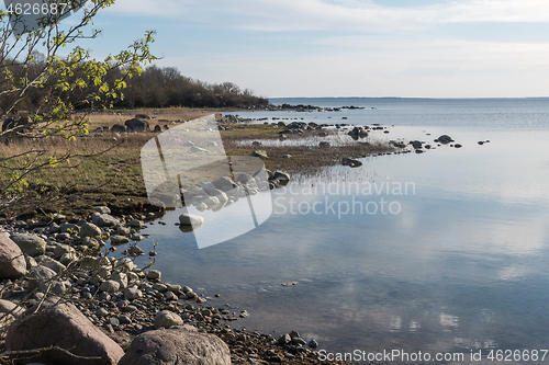 Image of Coastline in a stony bay