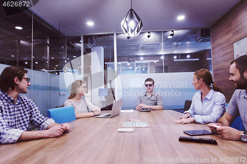 Image of startup business team on meeting at modern office