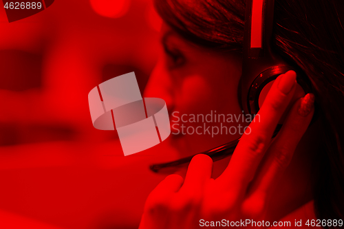 Image of female call centre operator doing her job