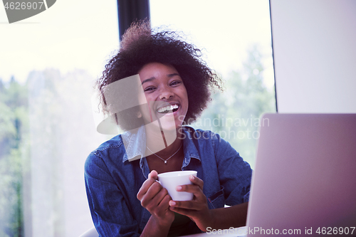 Image of African American woman in the living room