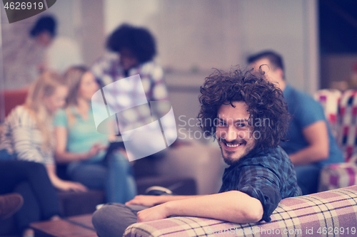 Image of Portrait of young informal businessman