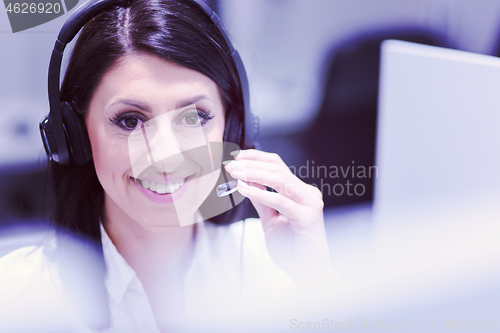 Image of female call centre operator doing her job