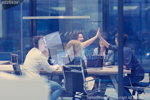 Image of startup Group of young business people celebrating success