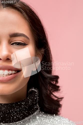 Image of Beautiful young woman with teeth braces