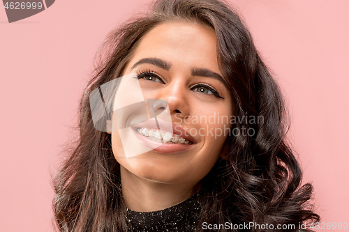 Image of Beautiful young woman with teeth braces