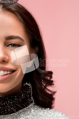 Image of Beautiful young woman with teeth braces