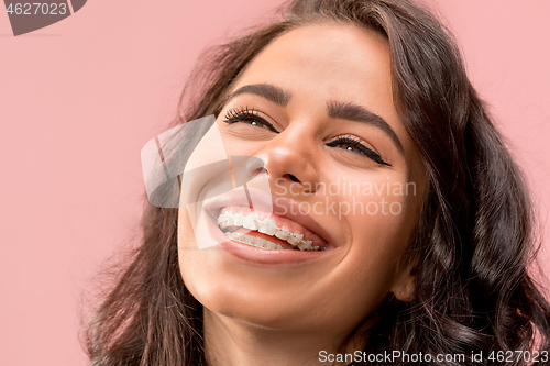 Image of Beautiful young woman with teeth braces