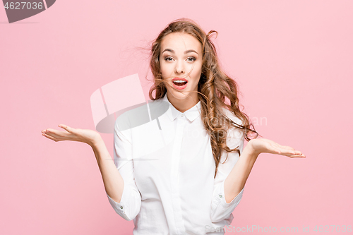 Image of Surprised happy beautiful woman looking in excitement.