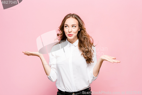 Image of Surprised happy beautiful woman looking in excitement.