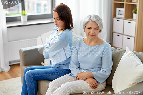 Image of disagreement between senior mother adult daughter