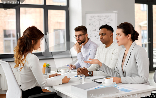 Image of recruiters having job interview with employee