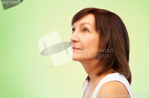 Image of portrait of senior woman over white