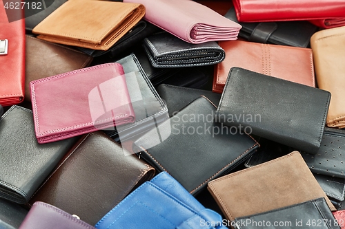 Image of Leather belts at a market