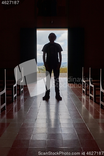 Image of Standing in the church door