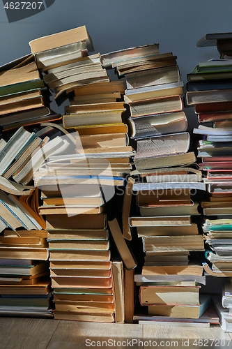 Image of Wall of books piled up