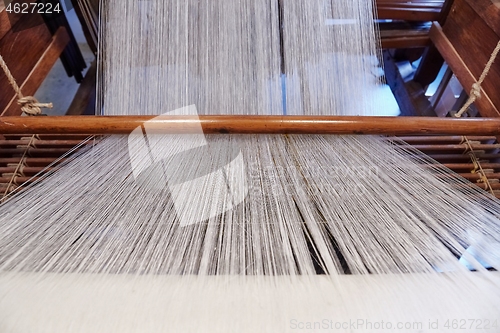 Image of Old loom detail woth qhite thread