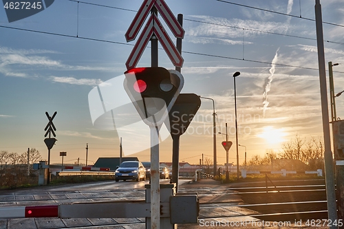 Image of Railway crossing closed, red lights