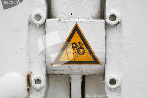 Image of Warning sign on heavy machinery