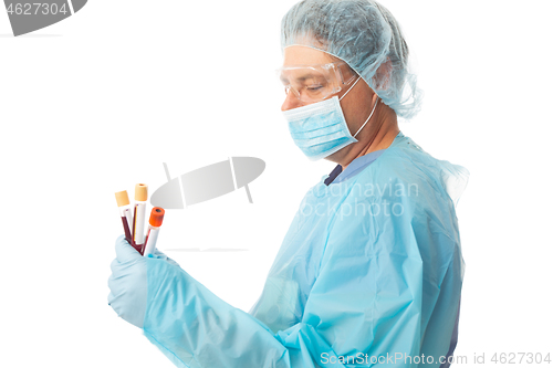Image of Nurse in hospital holding blood collection tubes