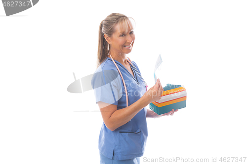 Image of Doctor or nurse holding a box of medical face masks