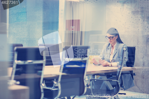 Image of Businesswoman using tablet