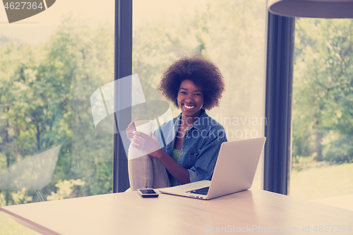 Image of African American woman in the living room