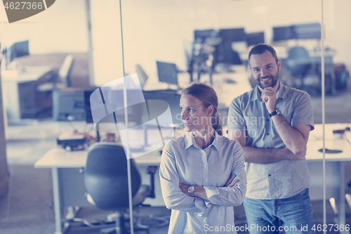 Image of business couple at office