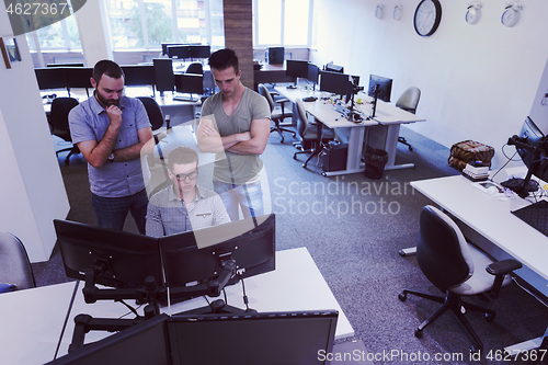 Image of startup business people group working as team to find solution