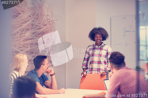 Image of Multiethnic startup business team on meeting