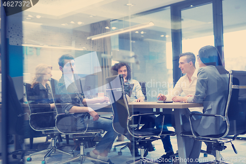 Image of Startup Business Team At A Meeting at modern office building