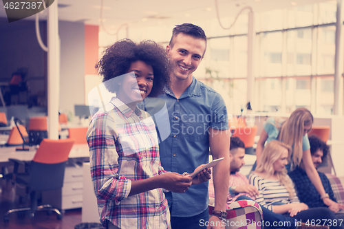 Image of Multiethnic startup business team on meeting two in front of the