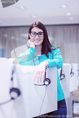 Image of female call centre operator doing her job