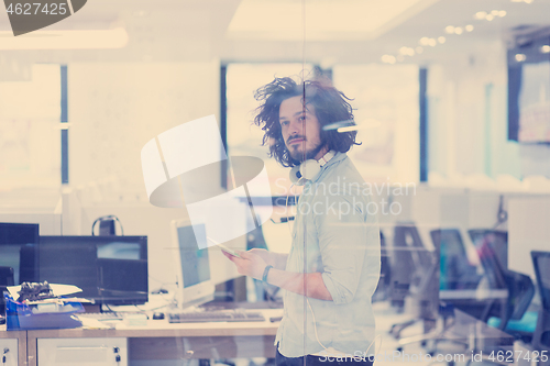 Image of businessman using tablet computer