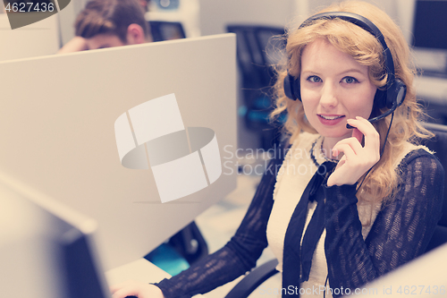 Image of female call centre operator doing her job