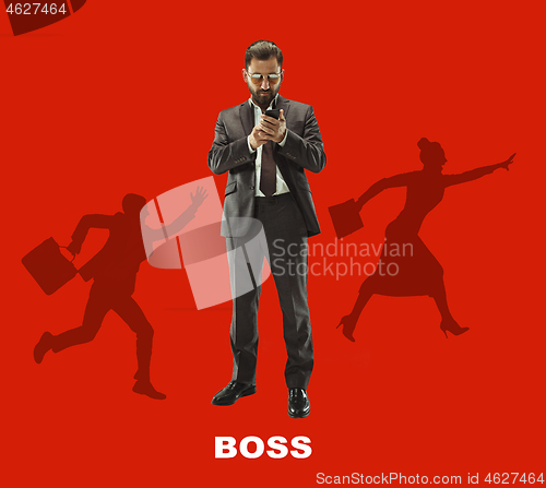 Image of Handsome businessman with mobile phone