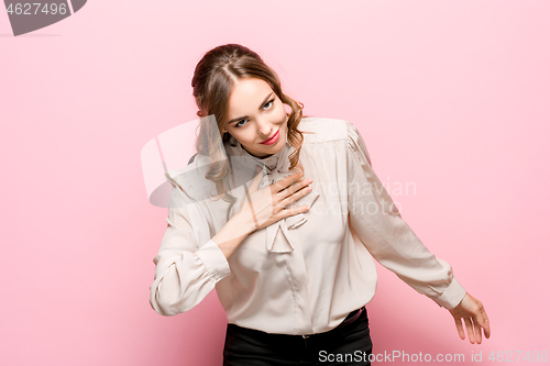 Image of Young Businesswoman Bowing