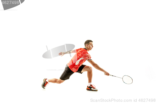 Image of Young male badminton player over white background