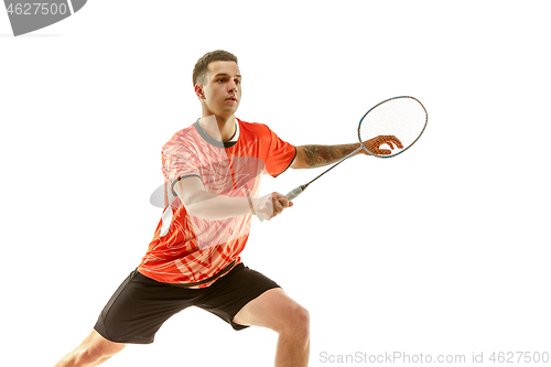 Image of Young male badminton player over white background